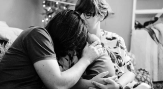 Annelies Moons en NIels Boutsen met hun zoontje Hugo
